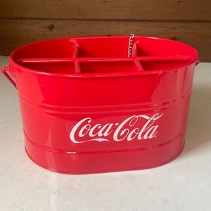 Coca Cola bottle holder with attached opener